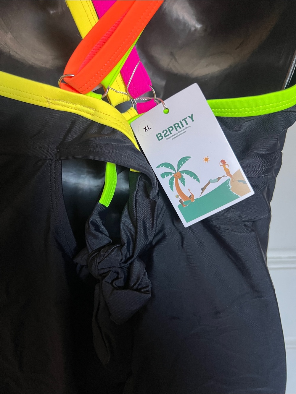 Black One-Piece Swimsuit with Neon Pink, Orange, Yellow & Aqua Trim - Picture 3 of 3